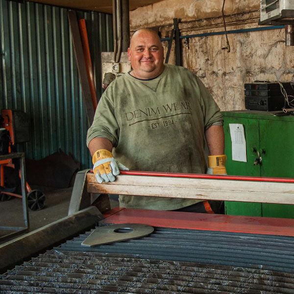 Alex Fembutor using a swift-cut 2500 CNC plasma cutting table